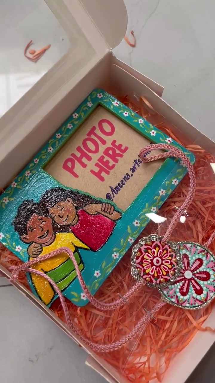 Custom gift box with photo-frame magnet and rakhis
